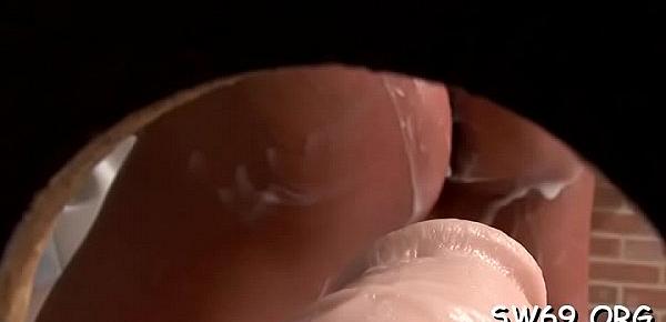  Horny wench sucks fake dick at gloryhole and gets meatballs slimed